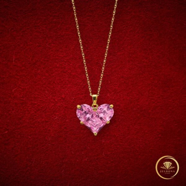 Eternal Pink Spark Necklace in red cloth background