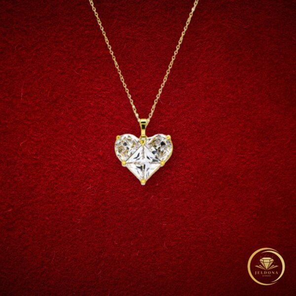 Golden Frost Heart Necklace in red cloth background