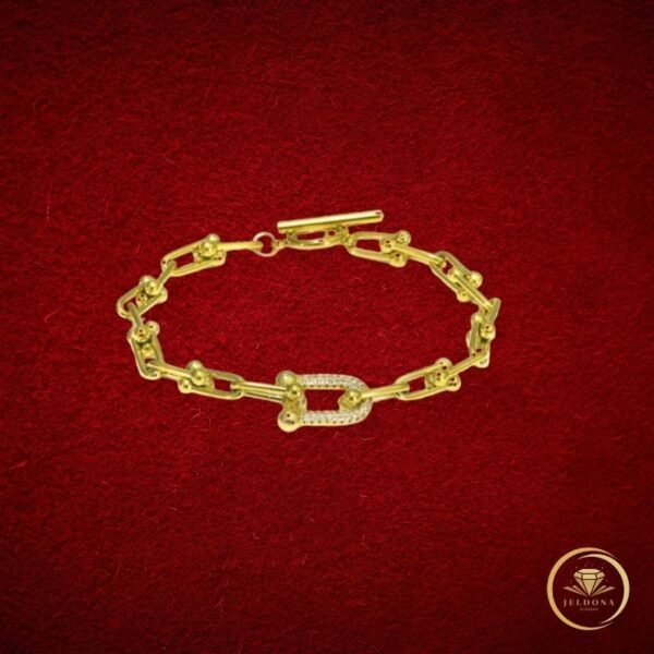 Golden Gleam Bracelet in red cloth