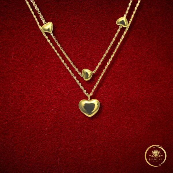 Golden Love Cascade Necklace in red cloth
