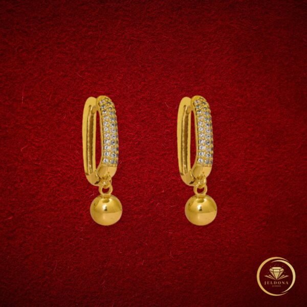 Golden Orbit Drops in red cloth