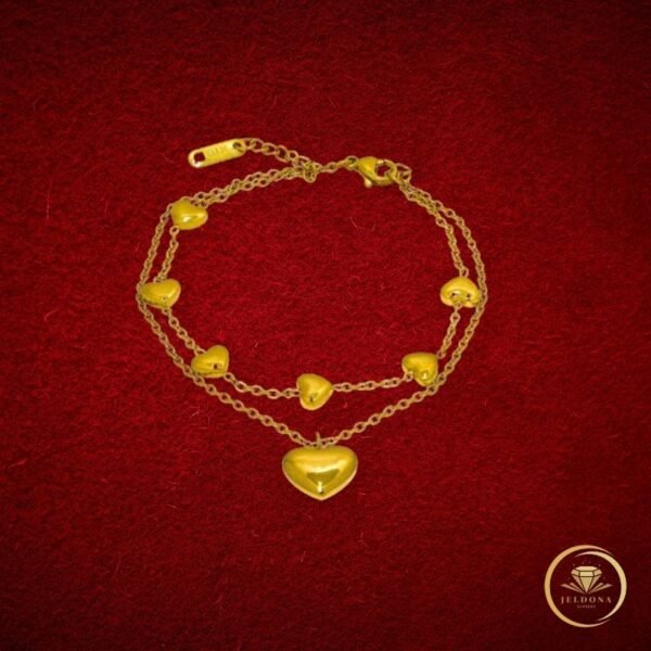 Golden Whispers Bracelet in red cloth