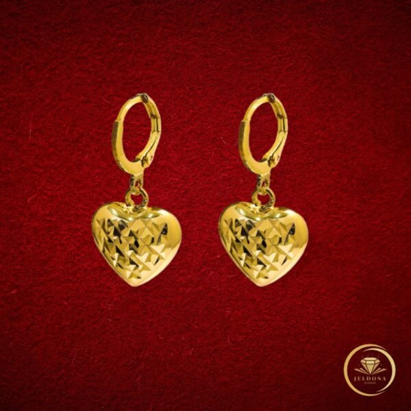 Lustrous Geometric Heart Earrings in red cloth